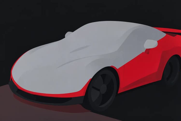 Close-up de uma capa de proteção para carro cinza cobrindo um carro esportivo vermelho