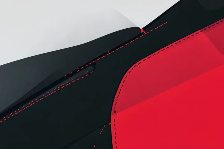 Detalhe de uma capa de banco de carro com costuras reforçadas e zíper lateral.